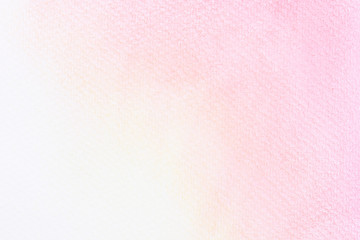 Abstract pink watercolor on white background.The color splashing in the paper.It is a hand drawn.