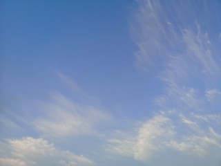 Cirrus, white clouds in the blue sky natural background beautiful nature environment