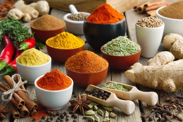 Foto op Aluminium Various aromatic colorful spices and herbs. Ingredients for cooking..Ayurveda treatments. © chamillew
