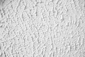 White  clean  old  peeling shabby cracked damaged   wall  paster work   Cement of building  with rough surface space for   textured  background close up