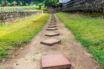 A row of tiled steps at Sri Dalada Maligawa or the Temple of the Sacred Tooth Relic, a Buddhist temple in Kandy, Sri Lanka. which houses the relic of the tooth of the Buddha.