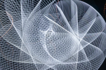 Light painting abstract background. White light painting photography, long exposure, ripples and...