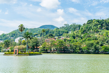 Kandy Lake or Kiri Muhuda or the Sea of Milk, an artificial lake in the heart of the hill city of Kandy, Sri Lanka, built in 1807 by King Sri Wickrama Rajasinghe next to the Temple of the Tooth.