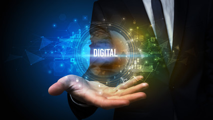 Elegant hand holding DIGITAL inscription, digital technology concept