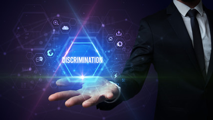 Man hand holding DISCRIMINATION inscription, social media concept