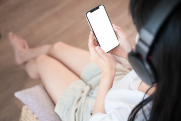 asian young woman listen to the music at home