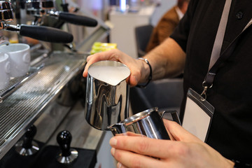  Barista making coffee at coffee machine