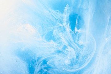 Abstract blue clear sky background with white soft clouds of smoke, lightness and weightlessness,...