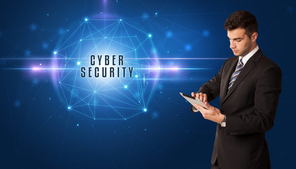 Businessman thinking about security solutions with CYBER SECURITY inscription