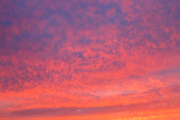 Sunset sky red clouds background