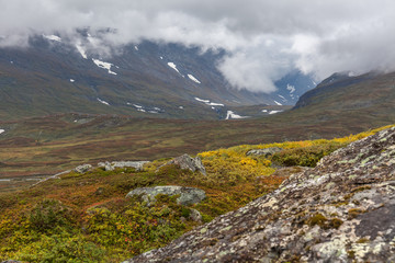 autumn view of Sarek National Park, Lapland, Norrbotten County, Sweden, near border of Finland, Sweden and Norway. selective focus
