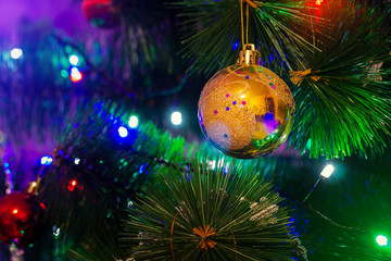 toy on a Christmas tree / new year mood background photo