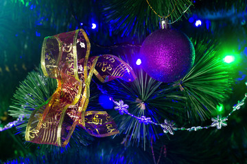 Obraz na płótnie Canvas toy on a Christmas tree / new year mood background photo