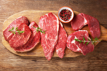 fresh meat with rosemary and spices, top view