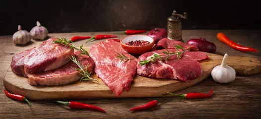 Fotobehang fresh meat with rosemary and spices © Nitr