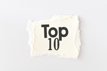 Top 10 text on a white sheet of paper and a white background.