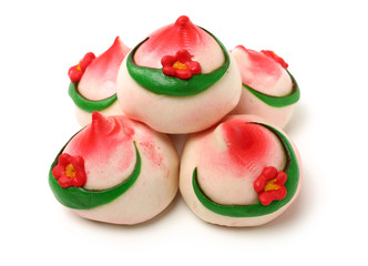 Traditional Chinese birthday bun named Shou Bao served on birthdays on white background