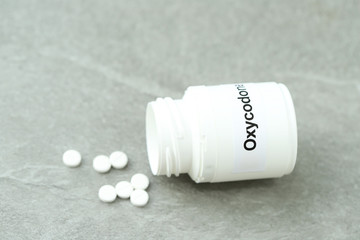 Oxycodone tablets. Opioid pain medication concept.
