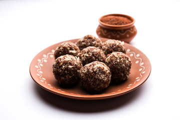 Aliv Laddu, Halim Ladoo or Garden cress Seed sweet Balls a very nutritious food in winters or for New Moms. popular food from India. served in a bowl or plate