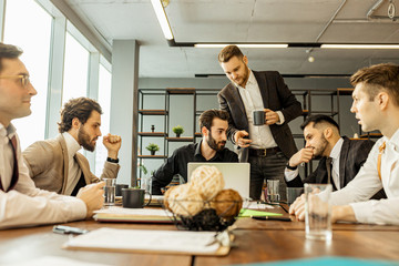 confident successful business crew coworking in office together, men in formal wear gathered to...