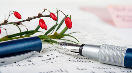 Fountain pen on a love letter with a brunch