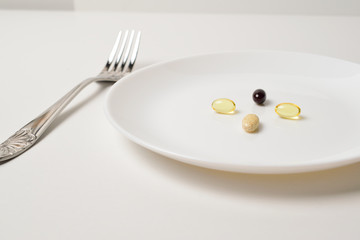 Meal replacement. Multivitamin and mineral supplements. Fish oil, vitamins and astaxantnin, omega.