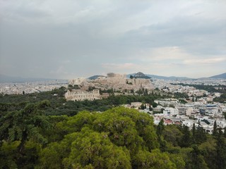 Fototapeta na wymiar View from a nearby hill over Athens to the Acropolis, Greece