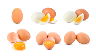 Fresh eggs and Boiled eggs on white background