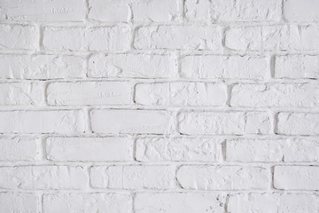 White wall background, closeup. Abstract brick texture