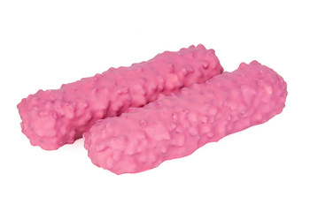 Pink chocolate crispy bar with wildberry taste isolated on the white