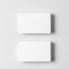 Empty white business card on white background