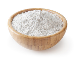 Rye flour in wooden bowl isolated on white background with clipping path