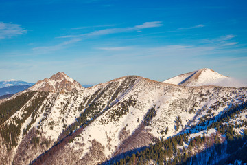 Winter mountain landscape in a sunny day. The Mala Fatra national park in Slovakia, Europe.