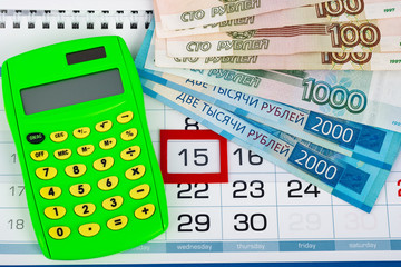 Calendar with a dedicated 15 number, calculator, Russian rubles