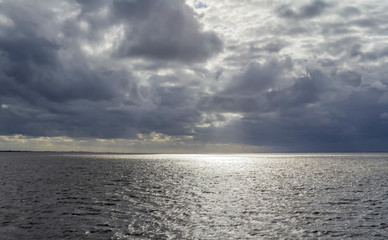 dramatic illuminated coastal scenery in Eastern Frisia