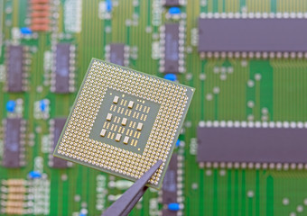 Electronic component held with tweezers