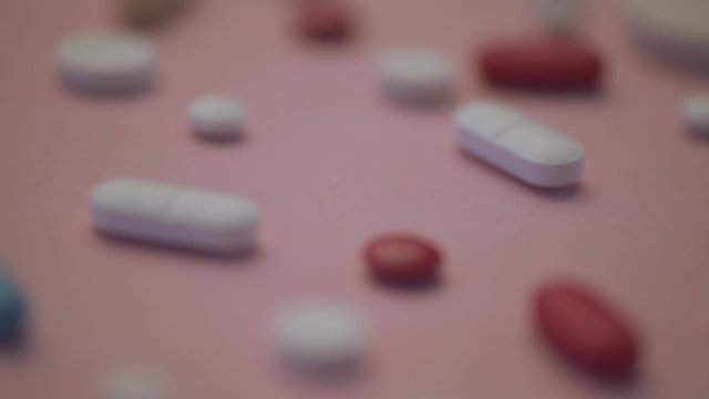 Various medicine pills and tablets, close up dolly shot