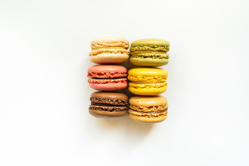 Sweet and colourful french macaroons or macaron on background, Dessert.
