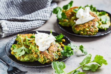 Green broccoli and pea pancakes with cream cheese.