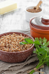 Buckwheat porridge in a bowl on a table