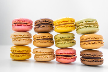 Sweet and colourful french macaroons or macaron on background, Dessert.