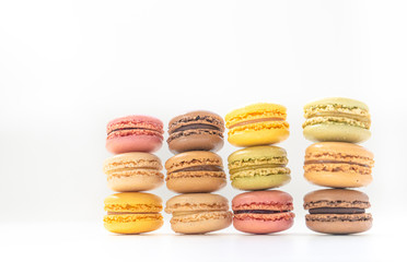 Sweet and colourful french macaroons or macaron on background, Dessert.