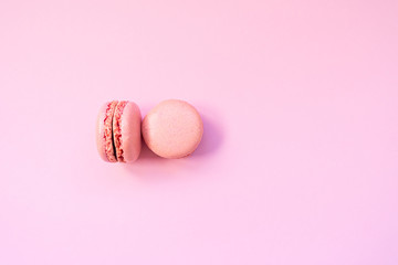 Sweet and colourful french macaroons or macaron on background, Dessert.