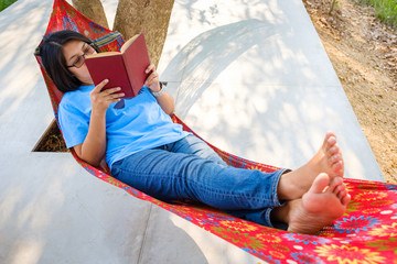 Reading Book in Hammock
