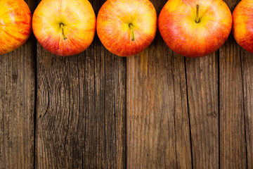apple fruits frame background, old weathered wood table