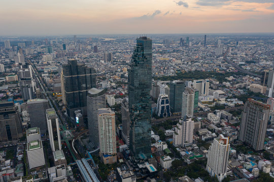 beautiful city view at twilight scene City scape of MahaNakhon building, skyscraper in the Silom/Sathon central business district of Bangkok as the tallest building in Thailand © Sathit Trakunpunlert