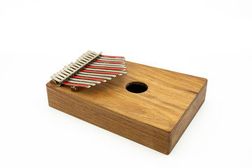 Thumb piano (Kalimba, Mbira) with silver and red tines