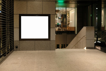 Blank billboard mockup near to escalator in  subway station.