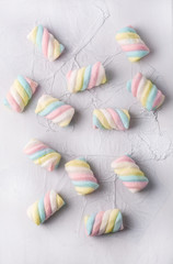 Candies in front of the neutral background