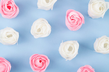 pattern with pink and white bright roses on blue background.